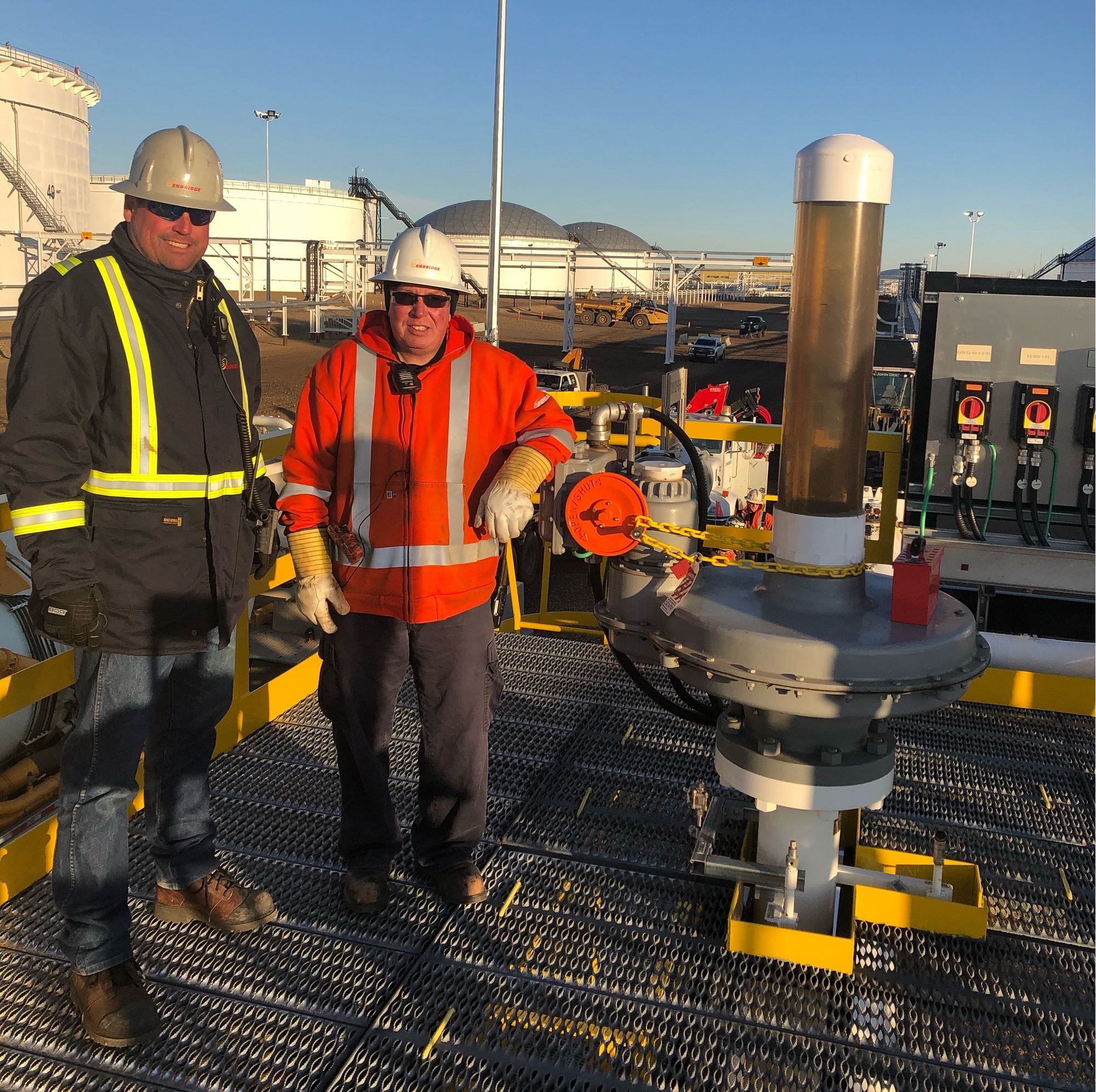 Workers at terminal with new valve